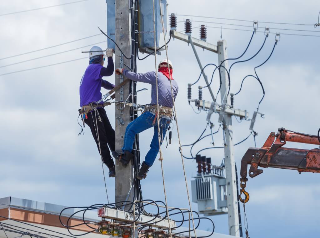 Workers on Utility Pole