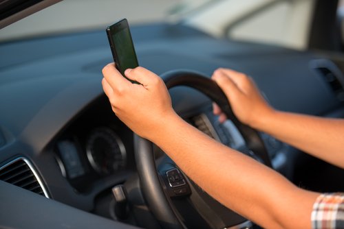 Person Texting while driving