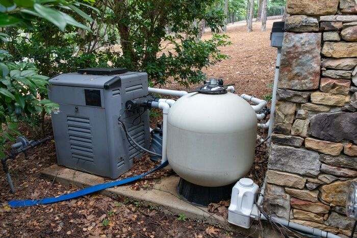 Pool pump and filtering equipment for maintaining a swimming pool